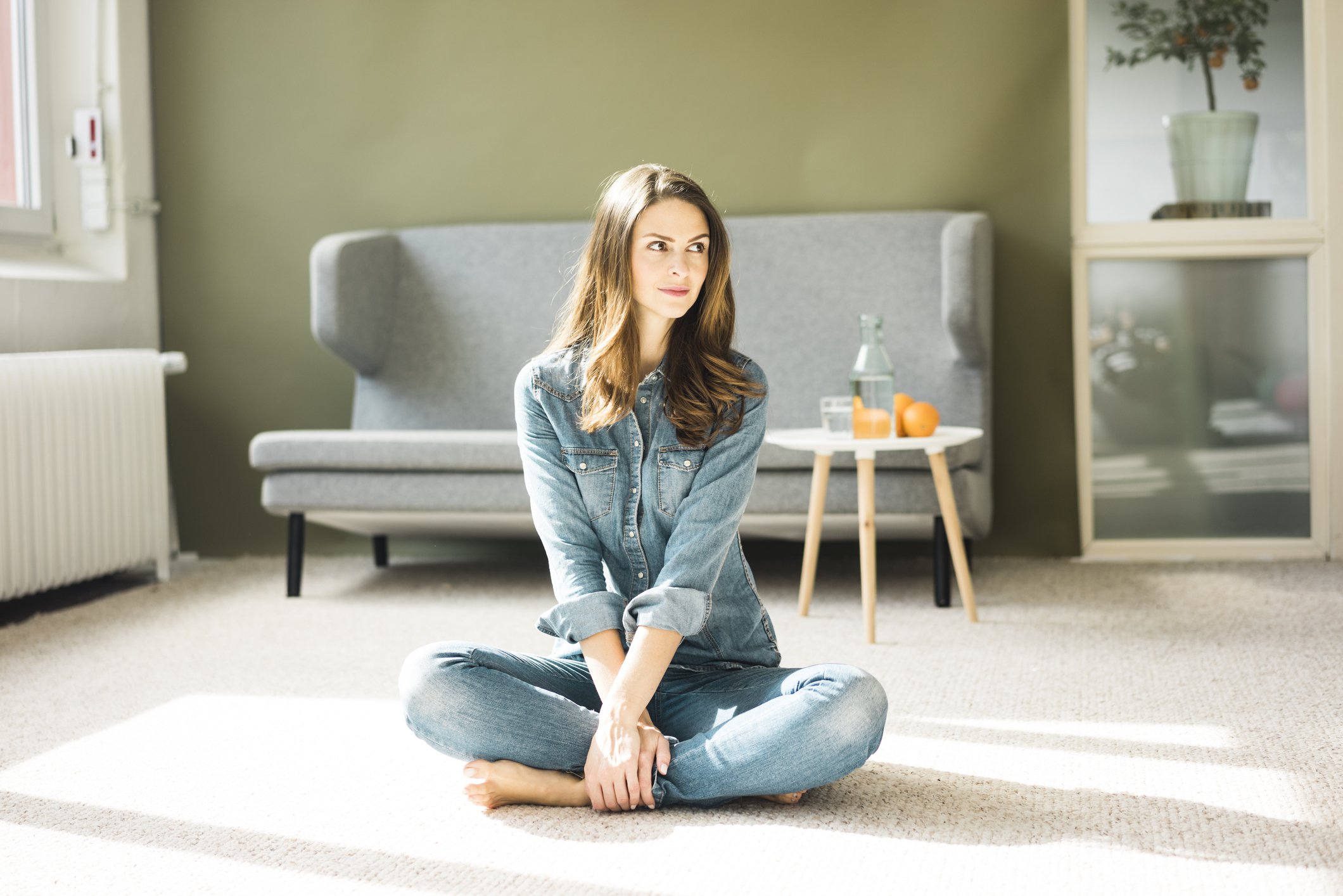 Women home. Woman on Sofa. Sitting on the Floor. Woman on the Floor. Woman sitting on Floor.